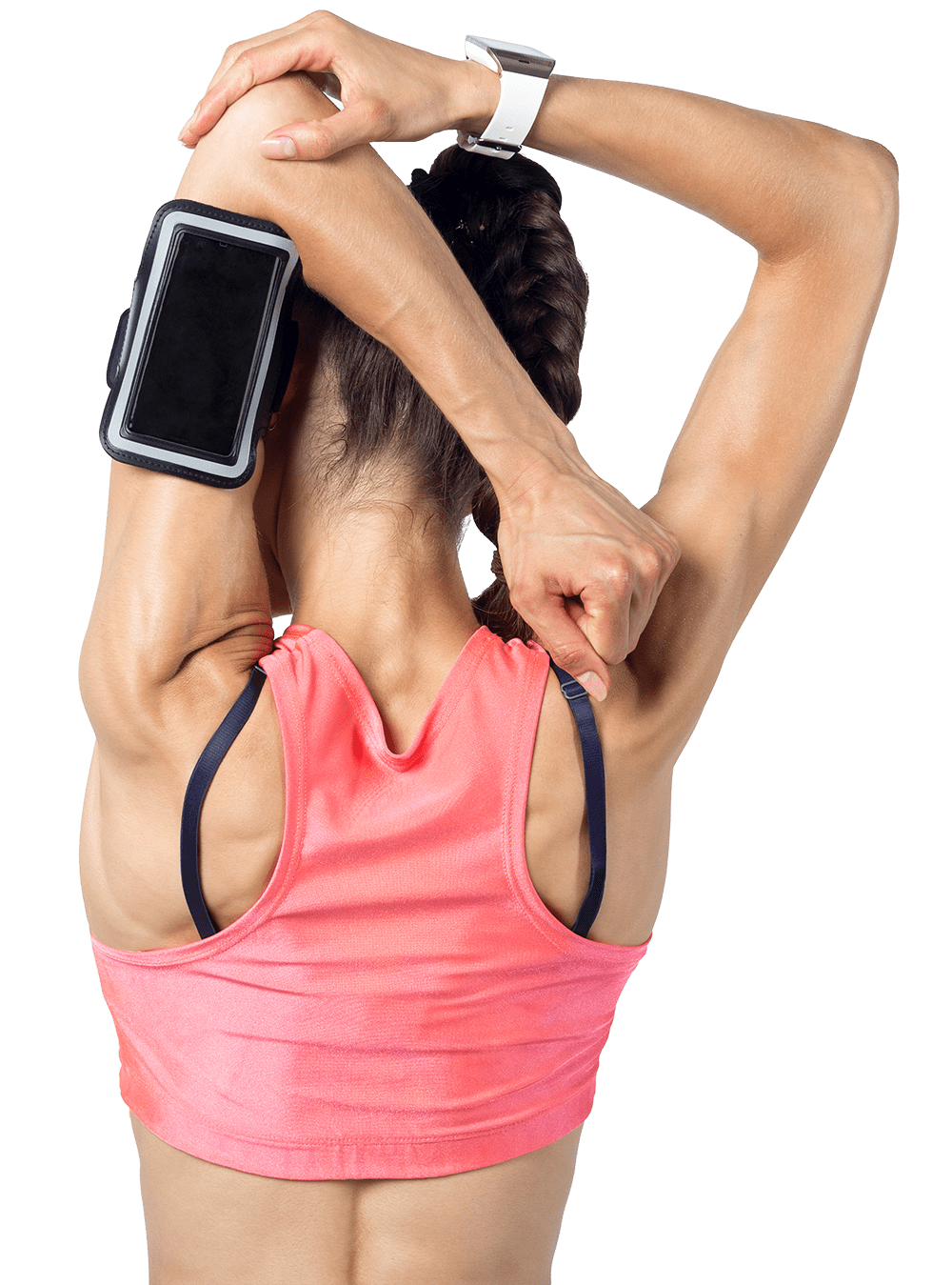 A woman stretches her arm behind her head while wearing a pink workout tank top and a smartphone armband, highlighting fitness and exercise preparation.